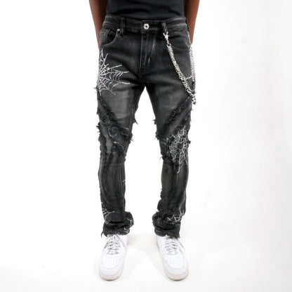 Stack denim pant w/ studded spider webs