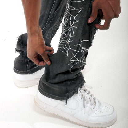 Stack denim pant w/ studded spider webs