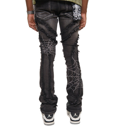 Stack denim pant w/ studded spider webs