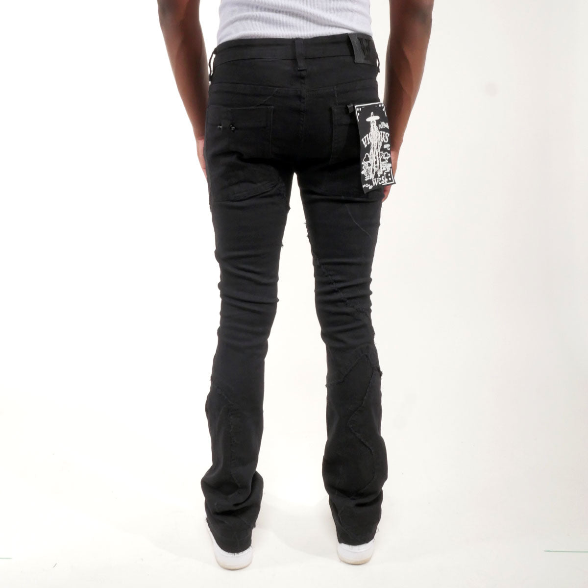 Rip & repair flare denim pant w/ metal ring details