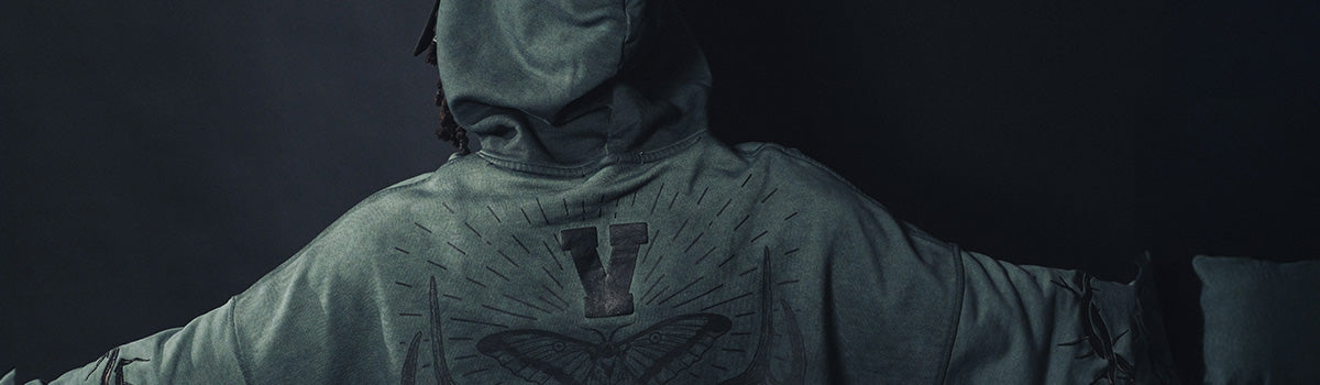 Close-up back view of a hoodie showcasing urban streetwear design details.